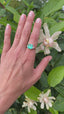 Emerald Solitaire Ring with Diamond Shoulders, Circa 1950